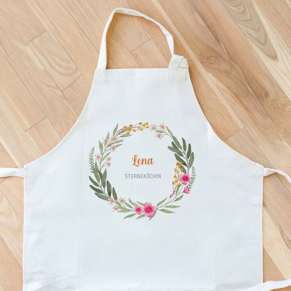 Personalisierbare Kochschürze mit Blumenkranz und Text